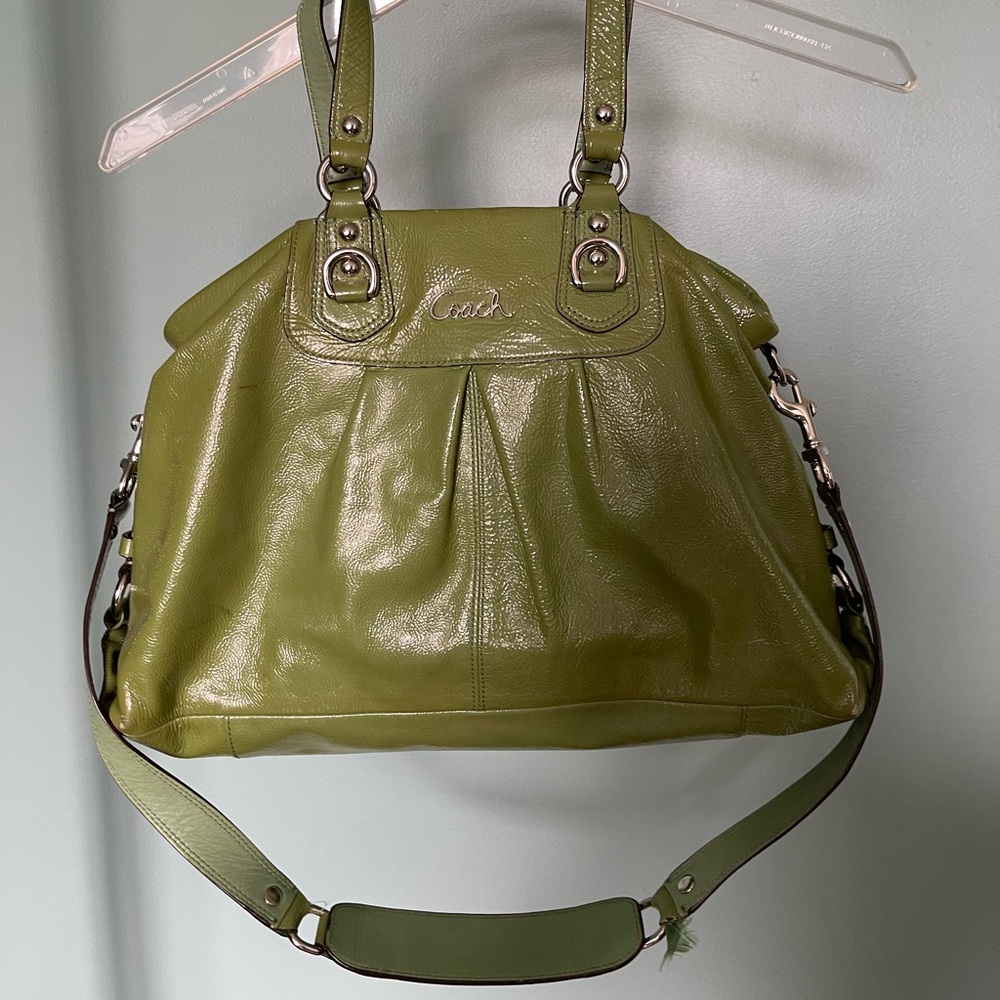 Olive green patent leather Coach handbag in good condition.